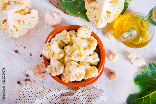 Head of cauliflower sits on a light table