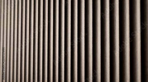 Smoked oak fluted panel featuring vertical 25mm wide V shaped routed grooves and flat recessed detail
