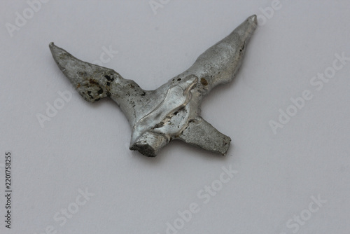 abstract images of whimsical metal shapes and surfaces