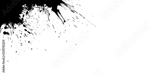 Black ink splatter corner design element on a clean white background