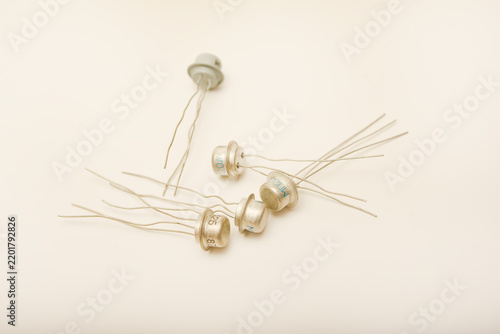фотографія Transistors in a metal case. Semiconductor elements.