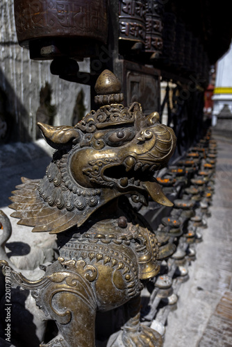 Fotografie Bronze Guardian Statue at Swayambhunath Shrine