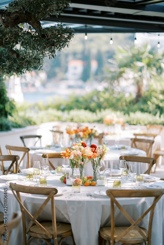Elegant outdoor wedding table with floral centerpiece