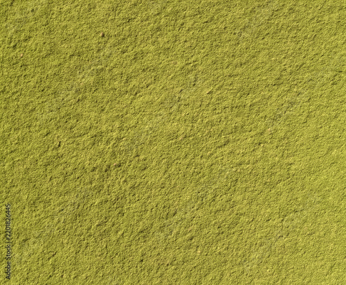 A close-up view of a textured green surface, reminiscent of a natural landscape. The image highlights the intricate patterns within the texture.AI generated!