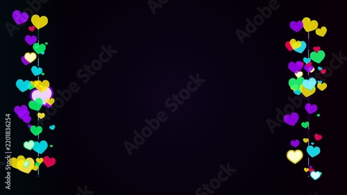 Bright colorful hearts framing sides on dark background