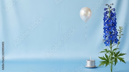 A beautiful blue background with a delicate flower and a balloon for a happy birthday greeting card
