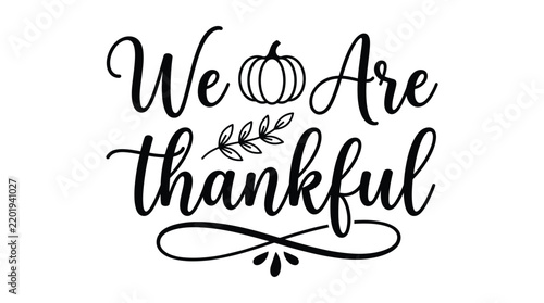 Calligraphy text we are thankful with a small pumpkin and leaf branch for thanksgiving holiday greeting cards