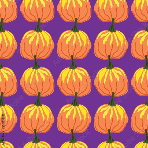 Orange and yellow pumpkins on a purple background seamless pattern
