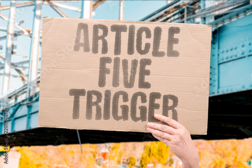 фотографія "Article Five trigger" Collective defense clause activation and automatic mutual response protocol