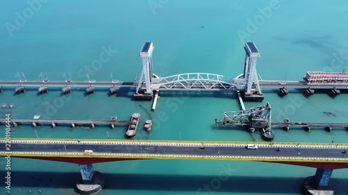High Angle Aerial View of New Pamban Indian Railway Bridge and Annai Indira Gandhi Road Bridge over Sea Waters. Pamban Railway Bridge and Road Bridge Across Turquoise Palk Strait Waters.