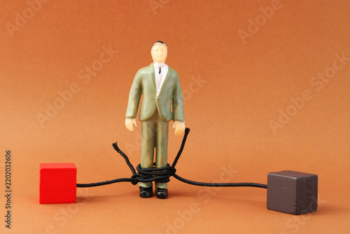 Foto Executive tied by multiple conflicts