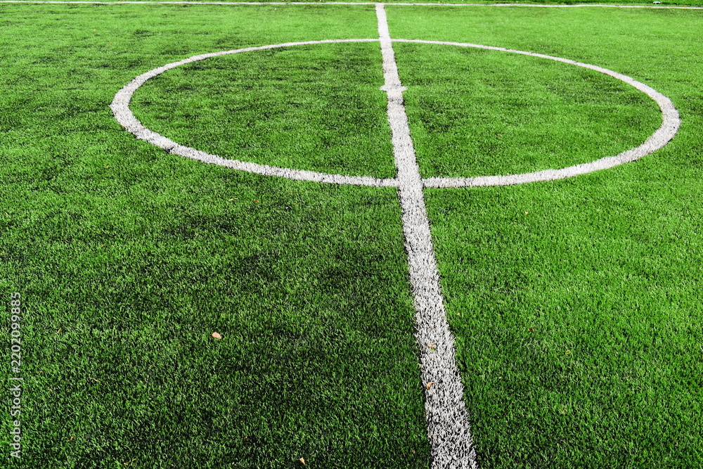 Obraz premium green synthetic grass field texture with white boundary line for sport background