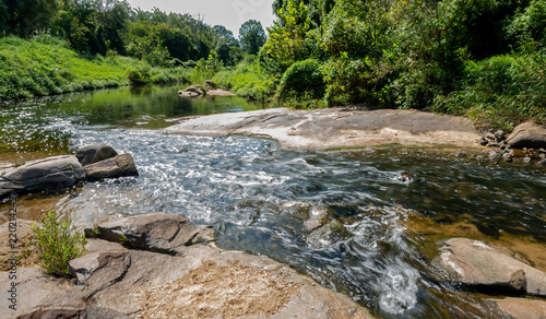 Water Rushing Past Boulders in a Shallow Creek