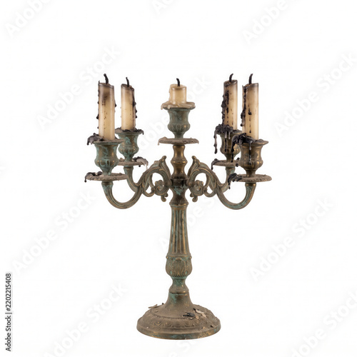 Old candelabra with four candle holders on a white background  