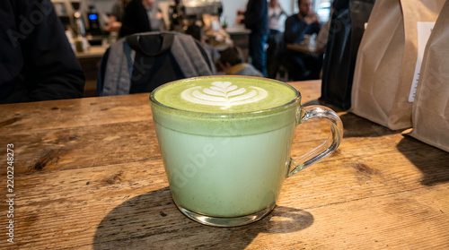 Vibrant Matcha Latte with Leaf Art