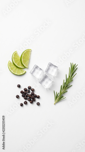 Gin Tonic Ingredients Flat Lay With Lime Ice Rosemary And Juniper