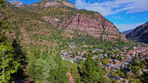 Perimeter Trail overlook reveals the historic town of Ouray nestled deep within steep rugged peaks of the Colorado San Juan Mountains