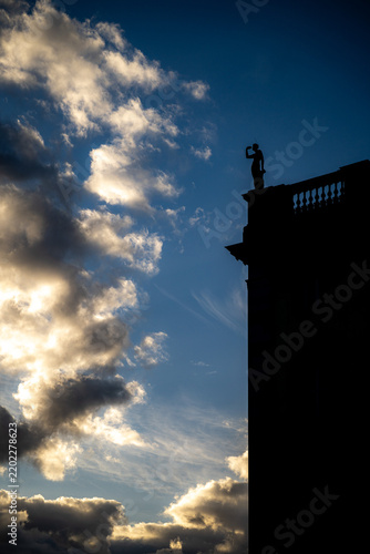 Underexposure of statue on Berlin castle in city center