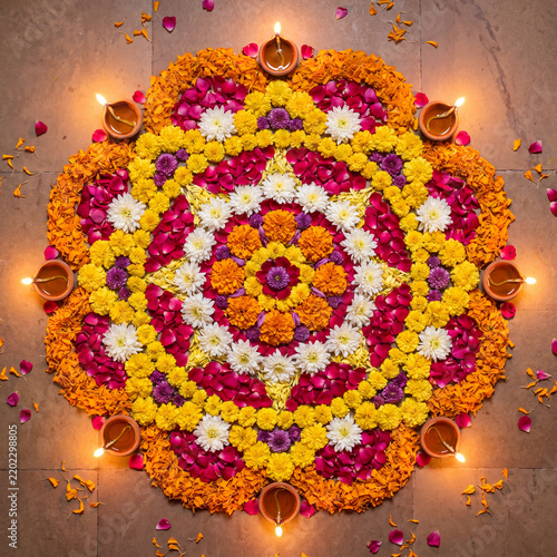 Diwali festival of lights floral rangoli design with colorful flowers  