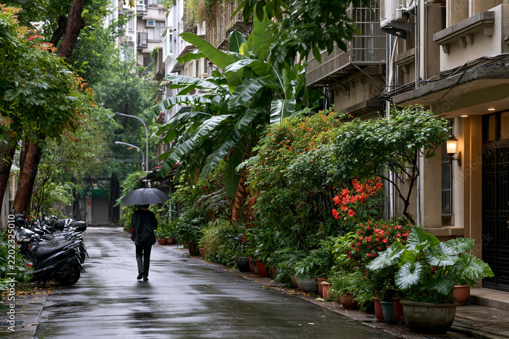 Fototapeta premium Rainy urban alley lifestyle in Taipei Taiwan