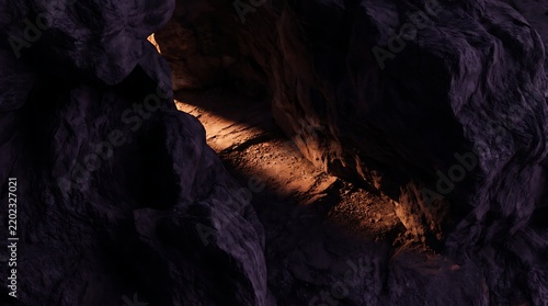 Sunlight shining into a dark narrow rock cave