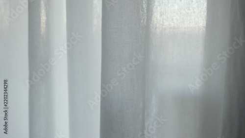white cotton curtains with natural light on a cloudy day