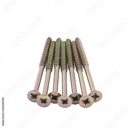 Konstfotografi A group of several brass-colored screws are laid out in a fan shape