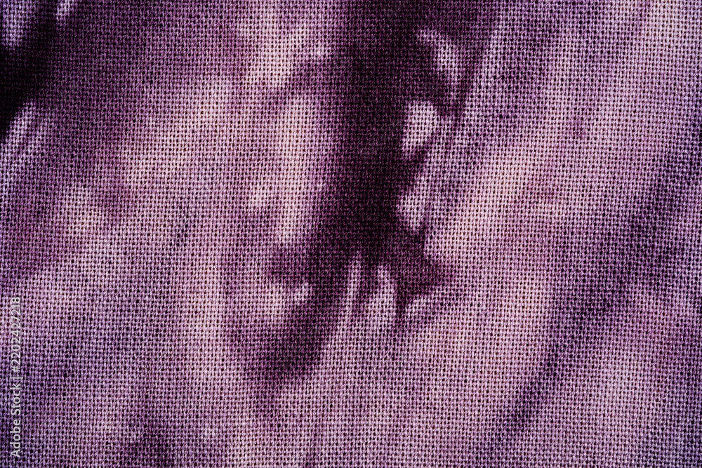 Obraz premium Close up macro view of purple tie dye fabric texture