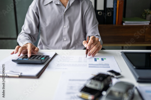 Male Insurance Professional Assessing Damaged Car and Discussing Insurance Documents Representing Claims Service Financial Protection and Vehicle Coverage