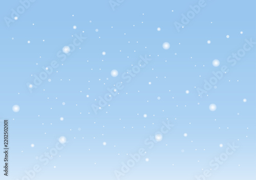 Soft blue winter background with falling snowflakes and subtle atmospheric depth