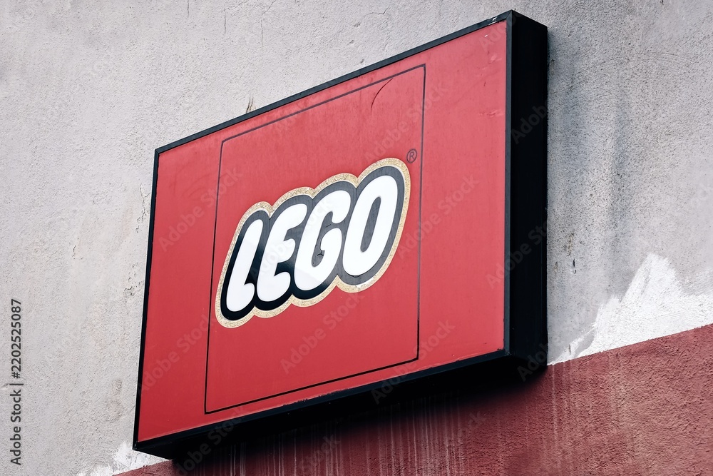Fototapeta premium Neu-Ulm, Germany - September, 13, 2026: Classic sign of Lego Store in Neu-Ulm, Germany. Lego Group is a construction toys manufacturer based in Billund, Denmark.