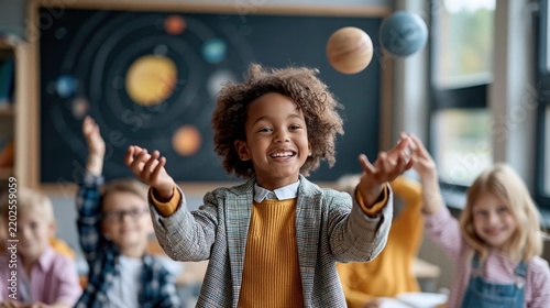 A joyful child showcases a fun learning environment by juggling planet models, symbolizing curiosity and the wonders of space education in a classroom setting.