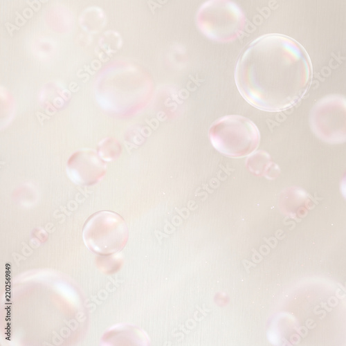 Pale ivory backdrop filled with soft round bokeh orbs in milky white a