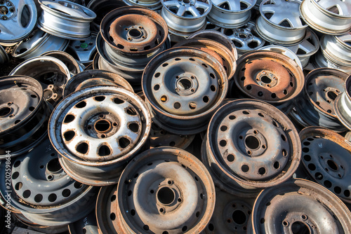 a pile of car rims