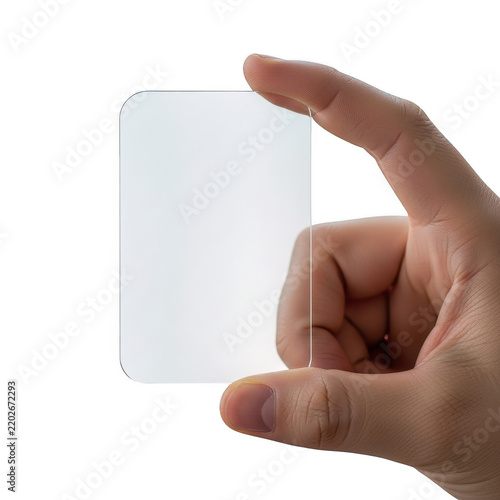Hand holding a small rectangular clear plastic card isolated on transparent background