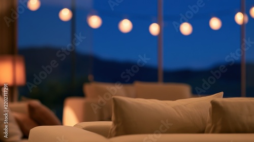 Blurred modern interior living room with glowing string lights and a scenic twilight view
