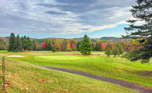A beautiful golf course on a cool cloudy autumn day in Canada	