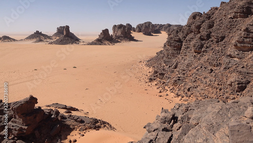 Trip to Sahara desert in Algeria. Beautiful african travel photo. Landscape with sandstone mountains, sand, sky, nature. Summer vacation in arab country.