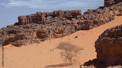 Trip to Sahara desert in Algeria. Beautiful african travel photo. Landscape with sandstone mountains, sand, sky, nature. Summer vacation in arab country.