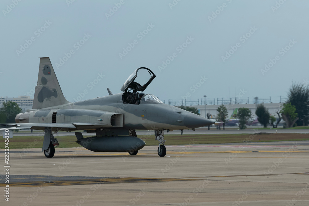 Fototapeta premium Fighter plane on abstract technology background