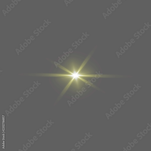Картината върху платно Golden glowing sparkle light effect, bright starburst flare, luminous flash and
