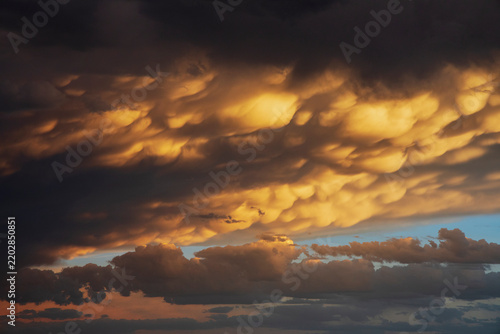 Mammatus clouds illuminated at Sunset over post texas Great Plains