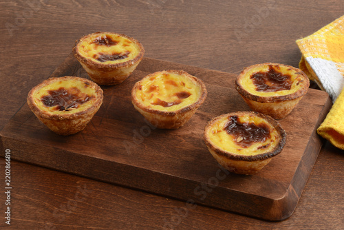 Portuguese Custard Tarts pastis de nata with yellow and white napkin