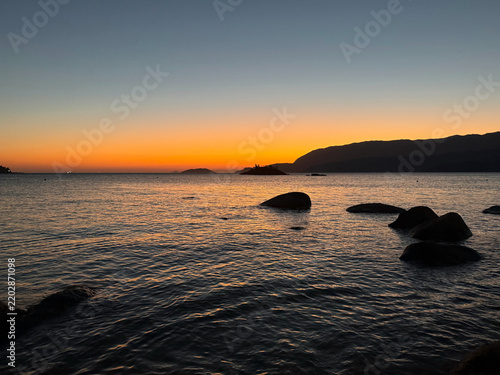 Beautiful sunset at Julião Beach in Ilhabela, Brazil.