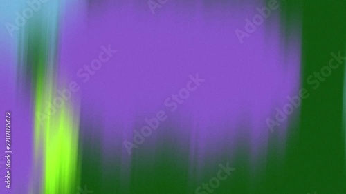 Abstract blurred vertical bands of purple, green, and blue create a vibrant, flowing motion effect.
