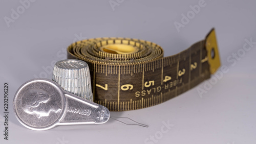 Fotografie Craft Materials - Sewing accessories with tape measure and needle threader