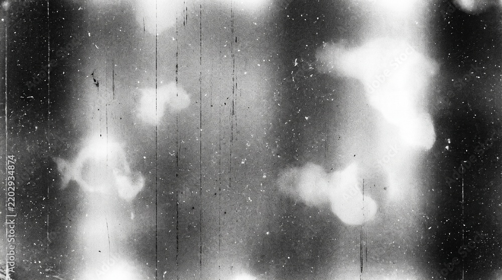 Fototapeta premium Old film texture with scratches, noise and light leaks. Realistic transparent overlay film texture in black-white, dust and grain. Distressed retro movie or photo negative effect of cinema nostalgia