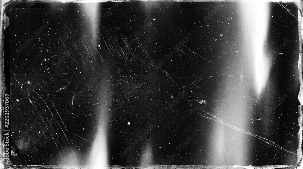 Fototapeta premium Old film texture with scratches, noise and light leaks. Realistic transparent overlay film texture in black-white, dust and grain. Distressed retro movie or photo negative effect of cinema nostalgia