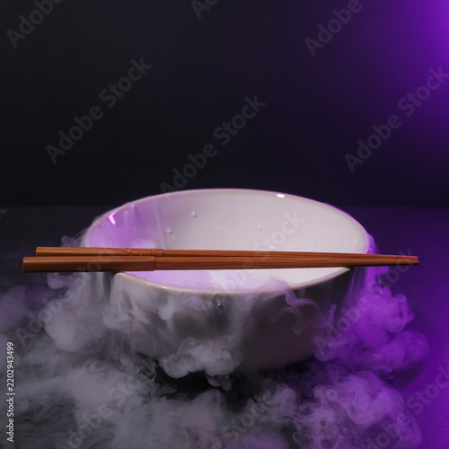 Steaming white bowl with chopsticks resting on rim against purple smoke background