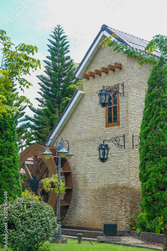 Modern house exterior with casement window and white wall rendering,Large estate minimal home building Window Frame,Cozy home in nature.